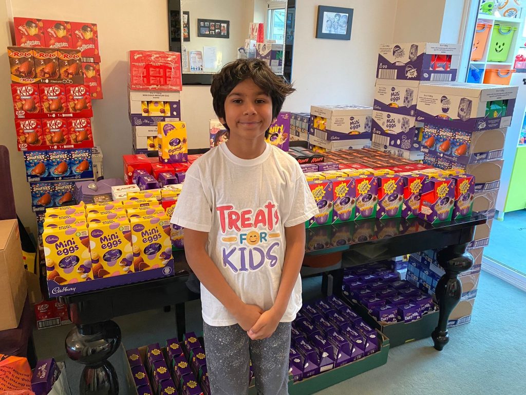 Treats for Kids – A Charity Set Up by Former Kids Inc Children | Kids Inc Nurseries A boy with lots of easter eggs for donation