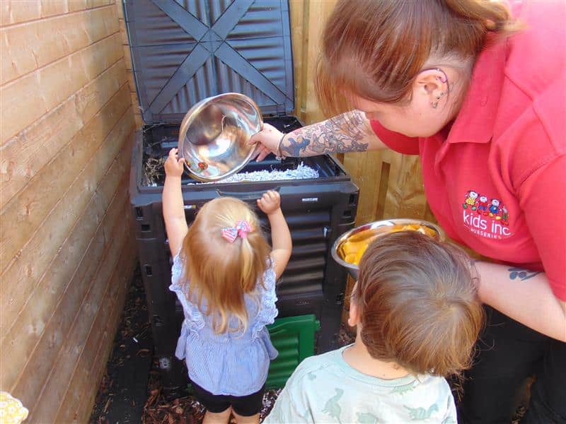 Sustainability at Kids Inc: Growing Green Futures | Kids Inc Nurseries kids in nursery staff with child